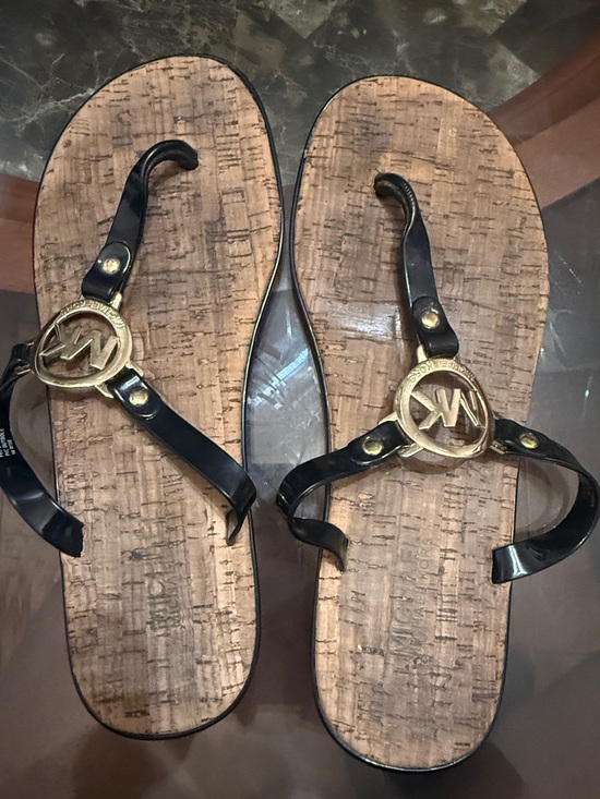 Michael Kors Shoes - Michael Kors Black Patent Thong Sandals with Gold Logo Medallions